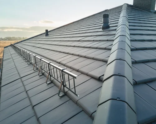 closeup-of-house-roof-top-covered-with-ceramic-shi-2026-03-17-17-13-01-utc